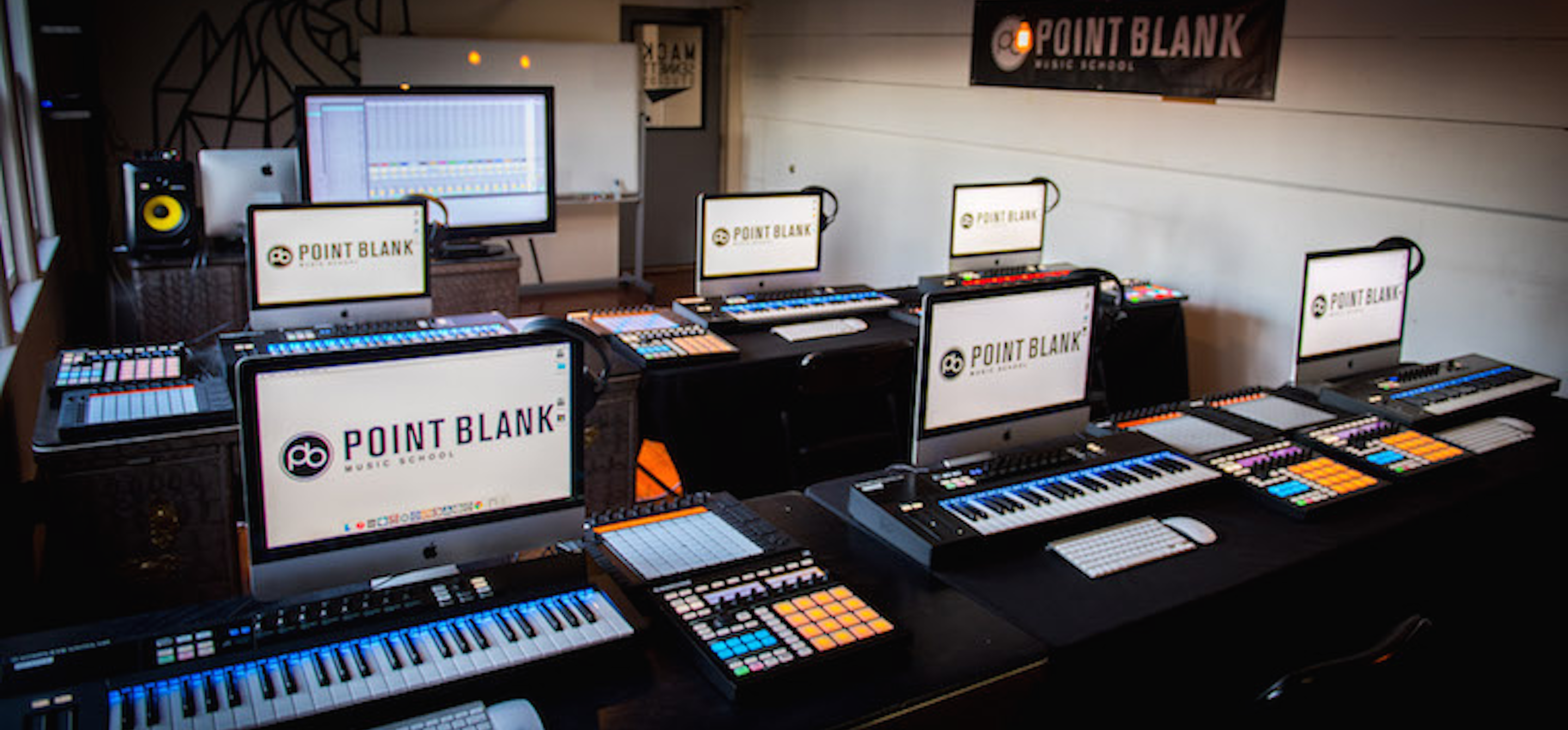 Studio with several computers and mini mixers