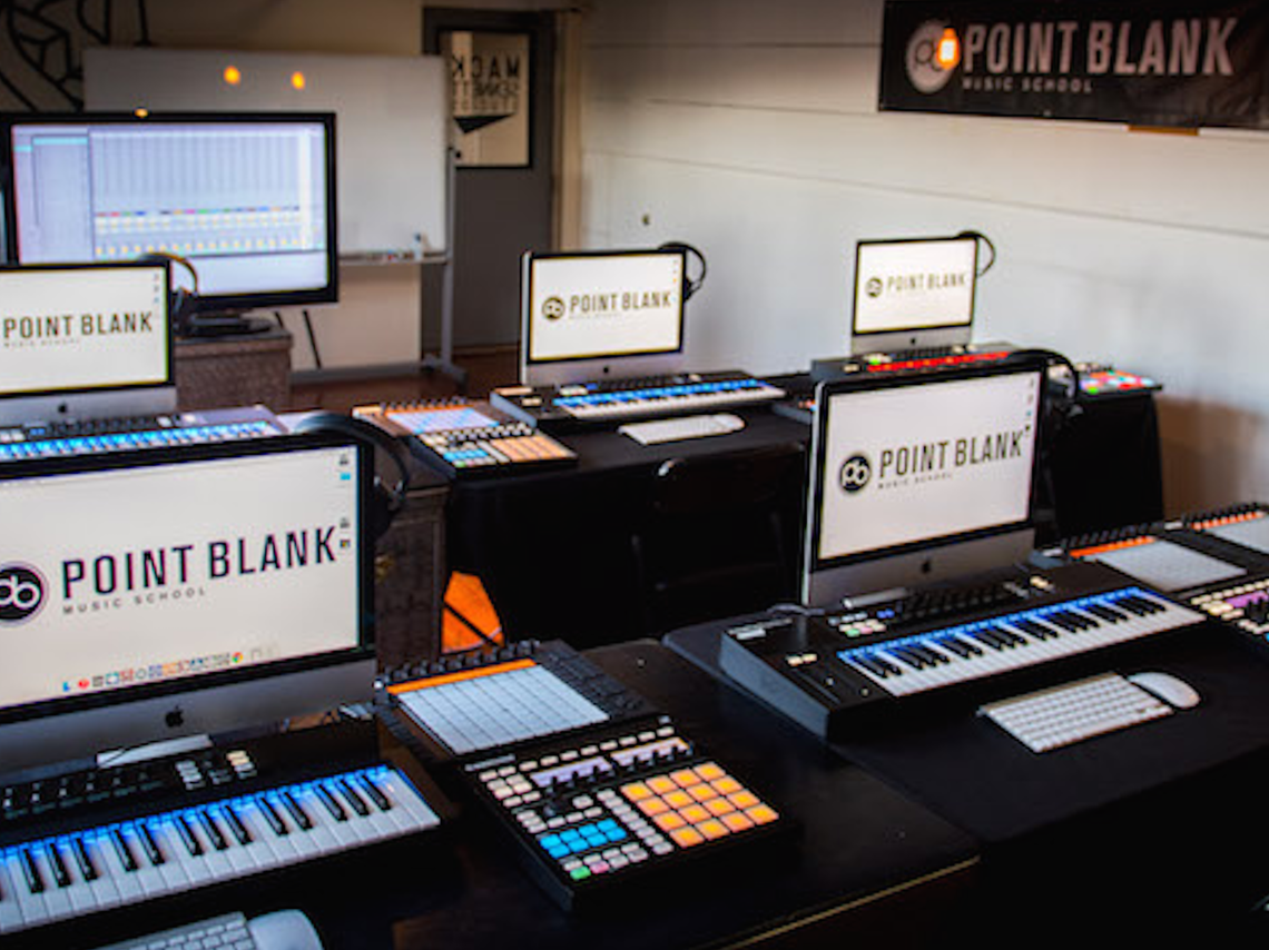 Studio with several computers and mini mixers